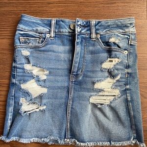 Distressed denim skirt